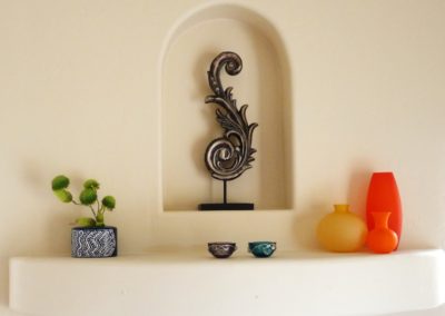 Interior Design, Mantle, Vases, Artwork, Sculpture, Bright color accents, The Designer's Eye, Shawn Barghout, Staging, paisley,